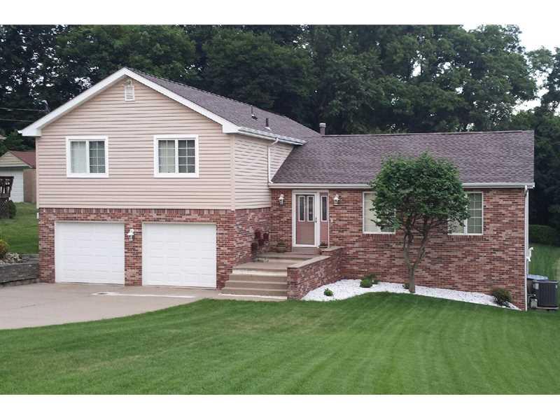 1534 Anderson Road Pittsburgh, PA 15209 - Photo 1 of 20 Exterior Front. Wide concrete driveway, brand new roof (50 yr. transferable warranty), manicured lawn, beautifully landscaped.