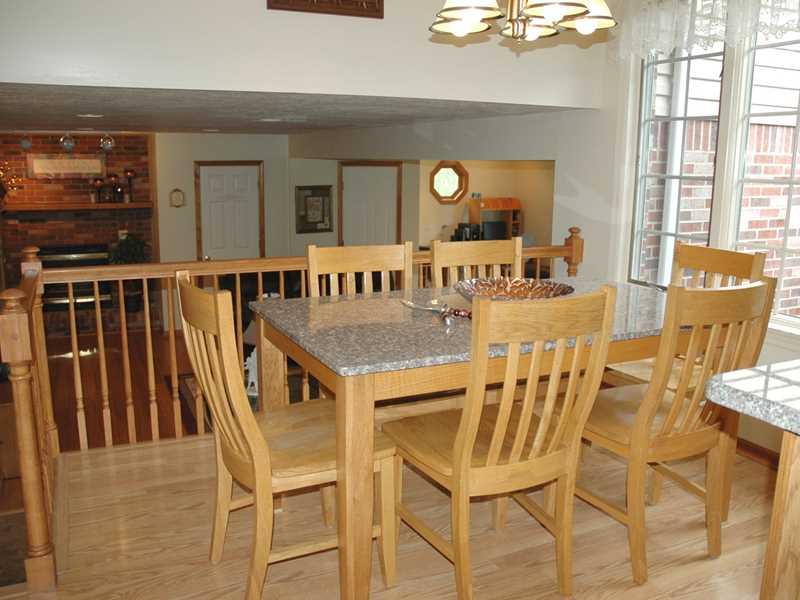 1534 Anderson Road Pittsburgh, PA 15209 - Photo 6 of 20 Kitchen. Eat-in area can accommodate a large dining table, has a wall of windows overlooking backyard and is elevated over family room.