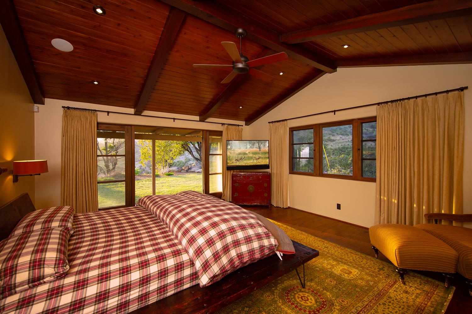 3191 Ladera Road Ojai, CA 93023 - Photo 13 of 29 a bed sitting in a bedroom next to a window