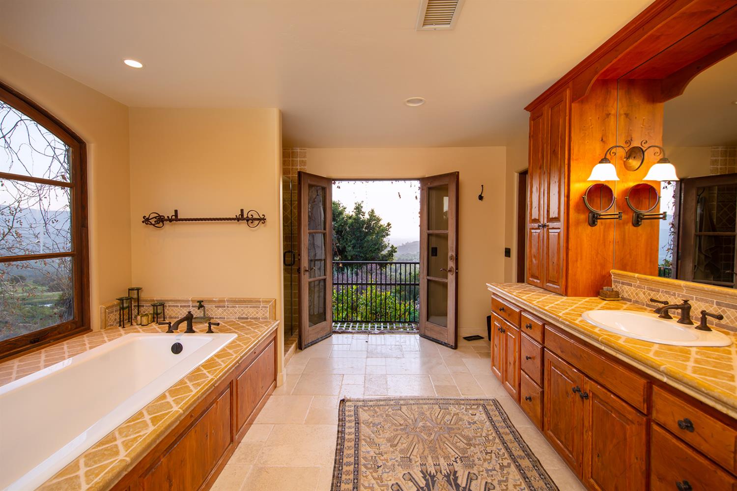 3191 Ladera Road Ojai, CA 93023 - Photo 16 of 29 a large bathroom with a large tub and sink