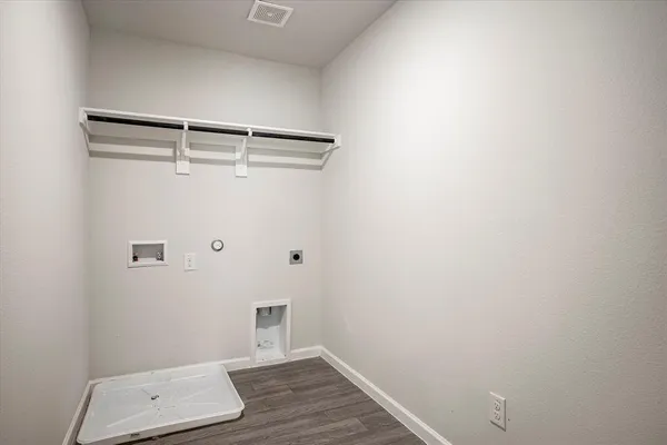 a view of room with hardwood floor