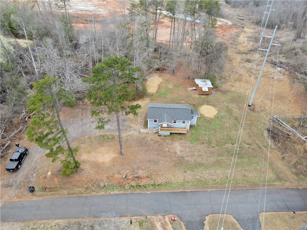325 Rock Quarry Road Travelers Rest, SC 29690 - Photo 36 of 37 An aerial perspective reveals a tranquil property amidst a natural landscape, offering quiet seclusion.