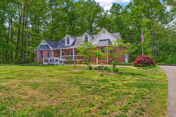 a house with trees in the background