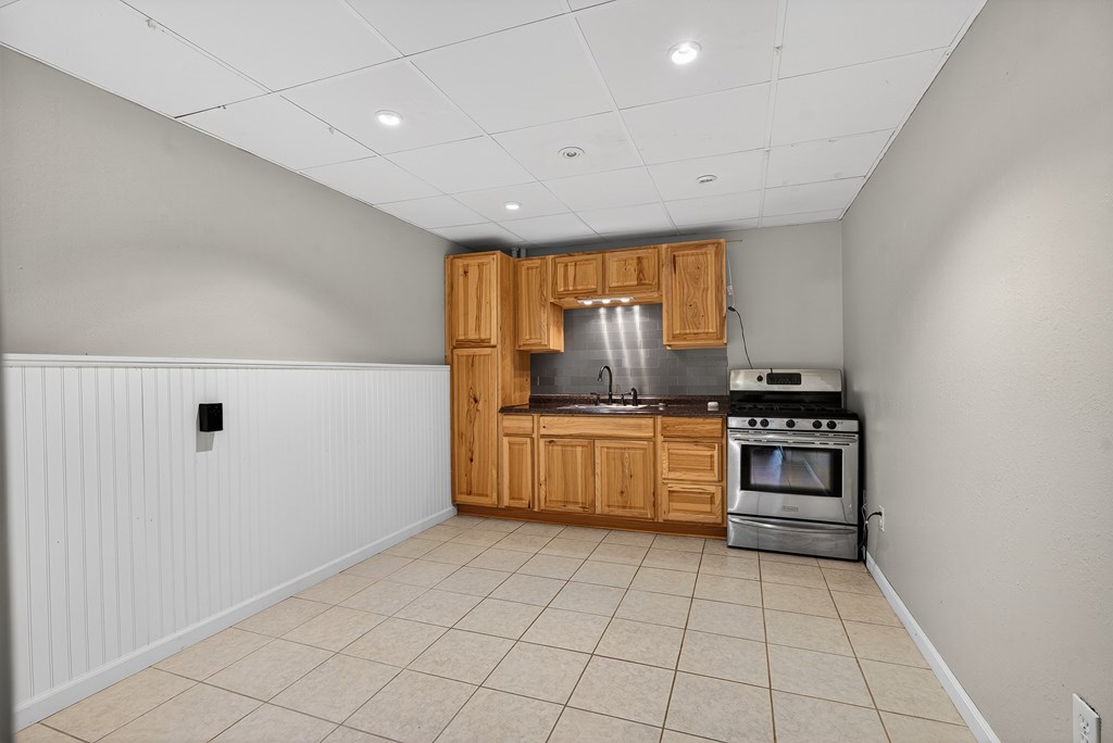 80 Sowers Road Blue Ridge, GA 30513 - Photo 33 of 58 a kitchen with stainless steel appliances a refrigerator and a stove top oven