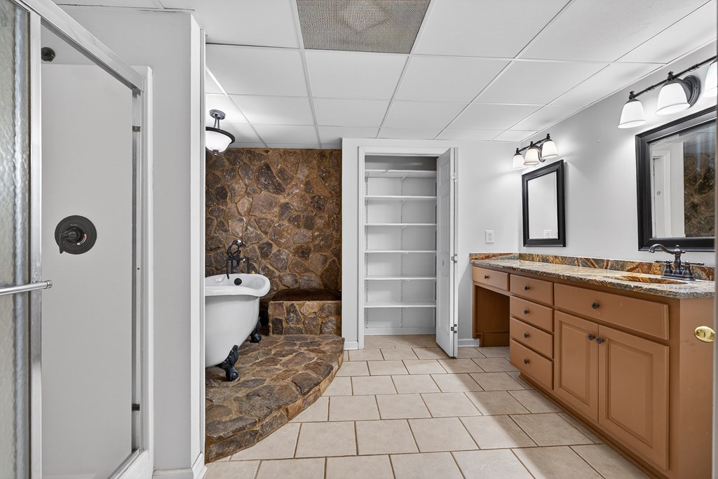 80 Sowers Road Blue Ridge, GA 30513 - Photo 37 of 58 a bathroom with a granite countertop sink mirror and toilet
