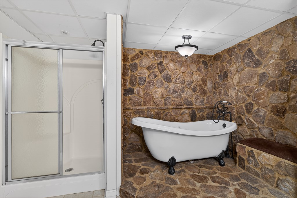 80 Sowers Road Blue Ridge, GA 30513 - Photo 38 of 58 a bathroom with a toilet and a shower