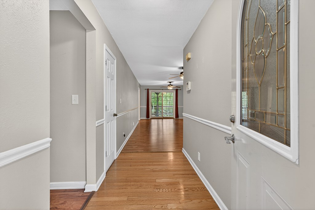 80 Sowers Road Blue Ridge, GA 30513 - Photo 4 of 58 a view of a hallway with wooden floor and staircase