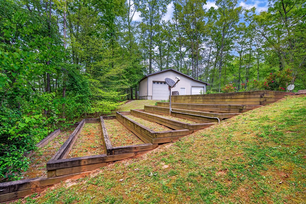 80 Sowers Road Blue Ridge, GA 30513 - Photo 46 of 58 a view of a house with a yard