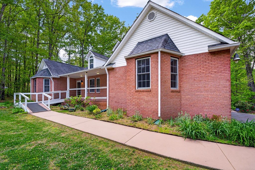 80 Sowers Road Blue Ridge, GA 30513 - Photo 53 of 58 a front view of a house with garden