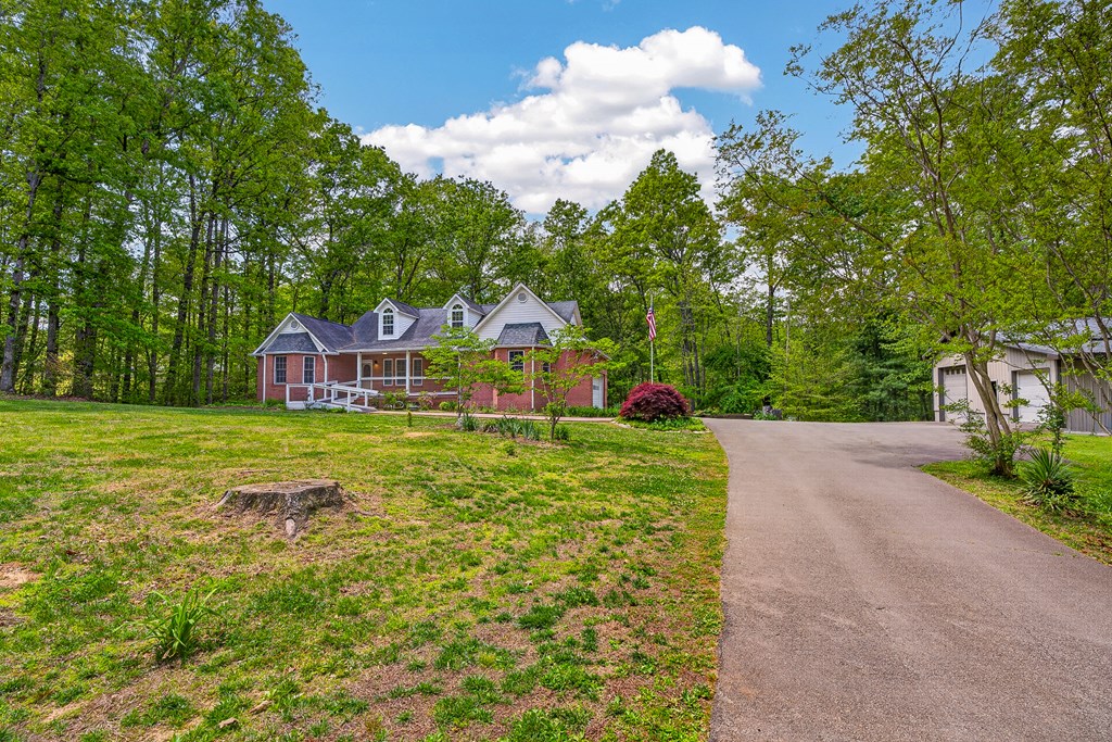 80 Sowers Road Blue Ridge, GA 30513 - Photo 54 of 58 a view of a house with a yard and sitting area