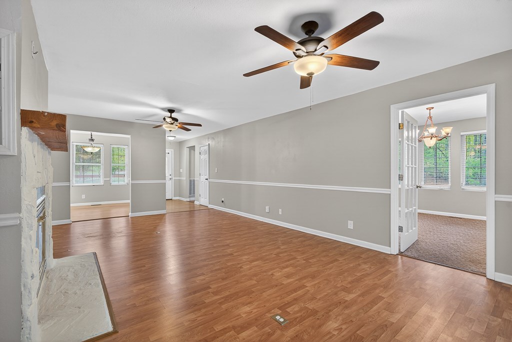 80 Sowers Road Blue Ridge, GA 30513 - Photo 7 of 58 wooden floor in an empty room with a window