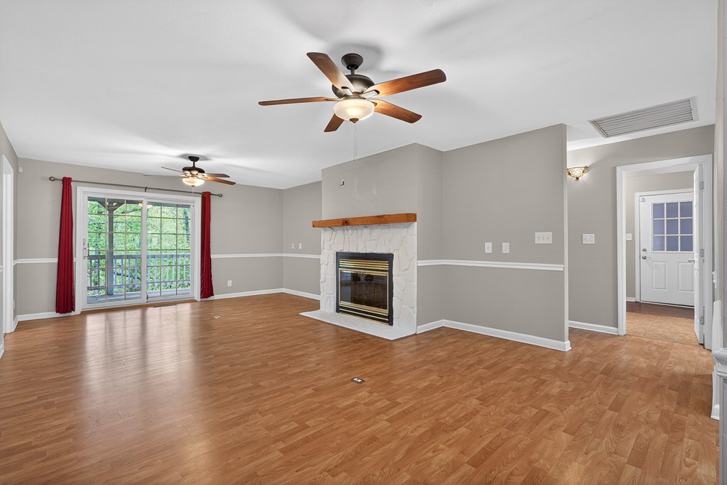 80 Sowers Road Blue Ridge, GA 30513 - Photo 8 of 58 an empty room with windows and fireplace