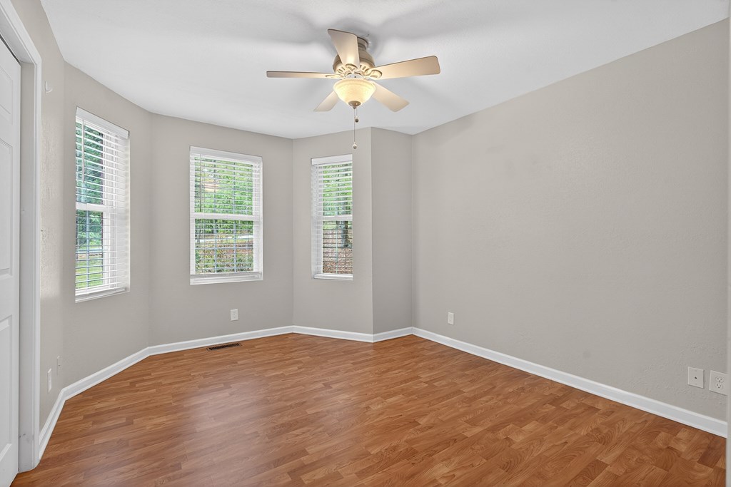 80 Sowers Road Blue Ridge, GA 30513 - Photo 10 of 58 wooden floor in an empty room with a window