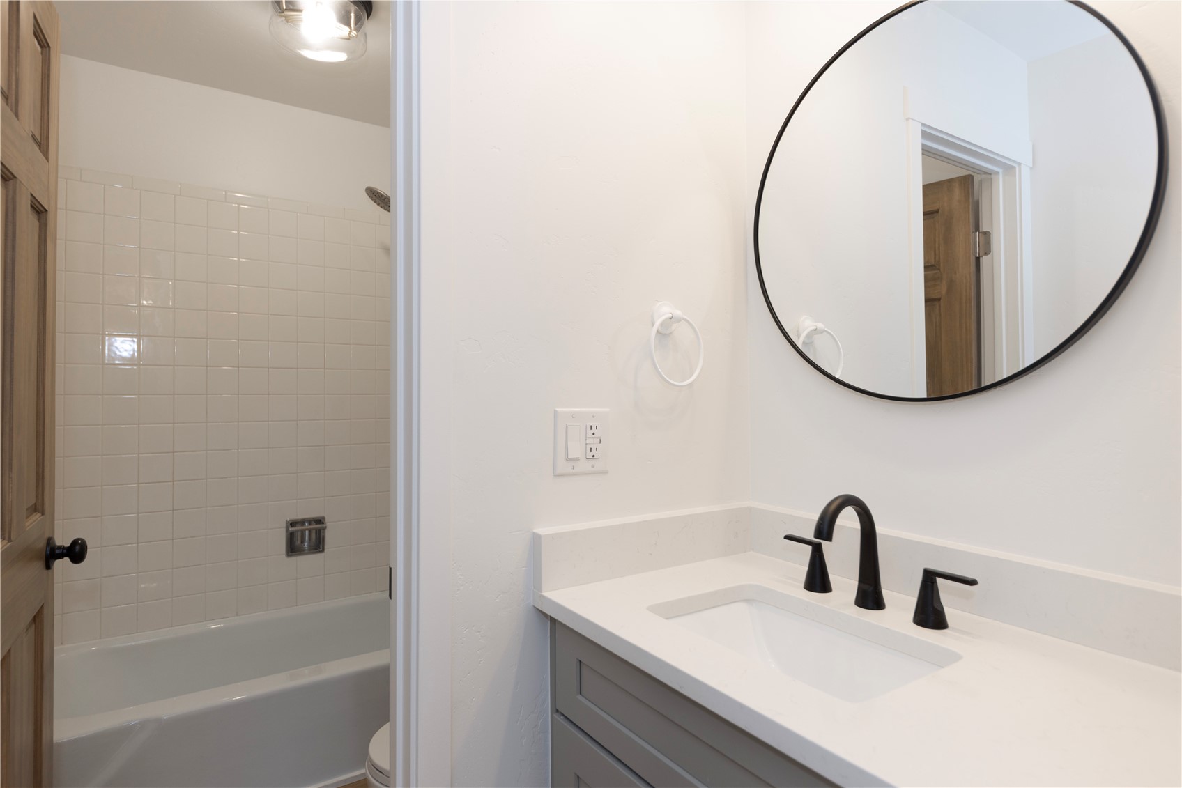 110 Evergreen Road, Unit 303 Dillon, CO 80435 - Photo 17 of 35 a bathroom with a sink and a mirror