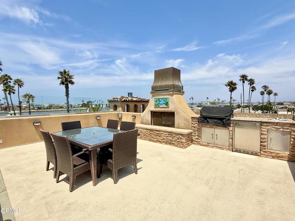 268 Sunset Drive Oxnard, CA 93035 - Photo 11 of 32 a view of a terrace with furniture and stove