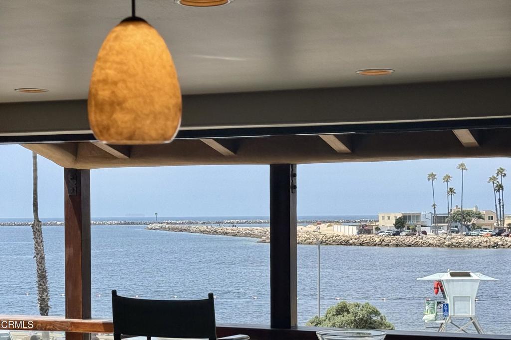 268 Sunset Drive Oxnard, CA 93035 - Photo 10 of 32 a view of table chair in the balcony