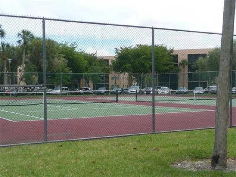 8420 Southwest 133rd Avenue Road, Unit 213 Miami, FL 33183 - Photo 15 of 16 a view of a park