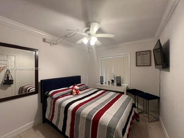 8420 Southwest 133rd Avenue Road, Unit 213 Miami, FL 33183 - Photo 8 of 16 a bedroom with a bed and a chandelier