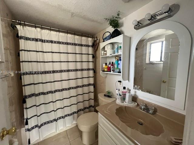 8420 Southwest 133rd Avenue Road, Unit 213 Miami, FL 33183 - Photo 9 of 16 a bathroom with a sink toilet and shower