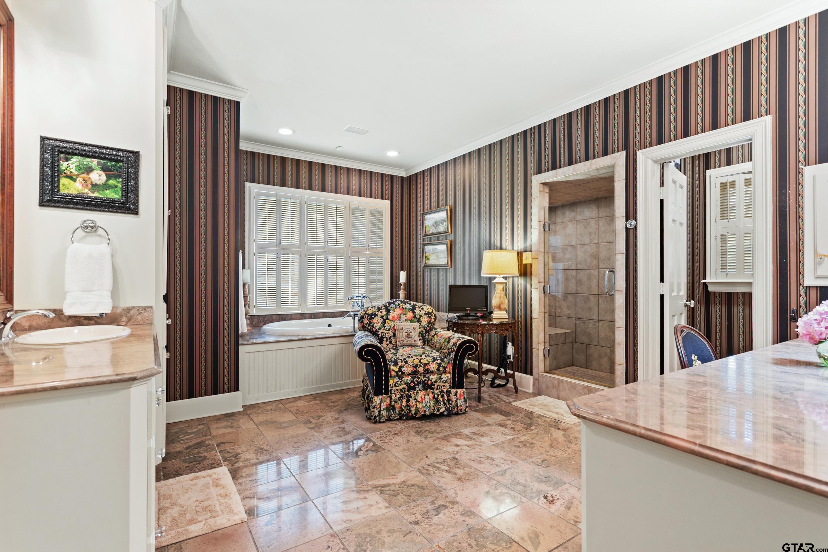 2631 Old Bullard Road Tyler, TX 75701 - Photo 21 of 43 a living room with furniture and large windows