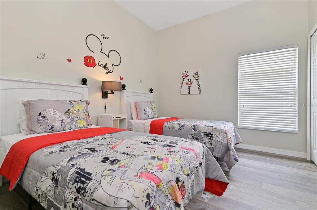 16640 Palm Spring Drive Clermont, FL 34714 - Photo 38 of 79 a bedroom with a bed and a window