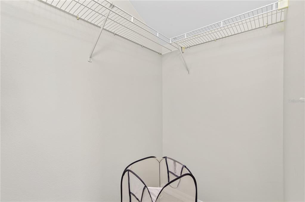 16640 Palm Spring Drive Clermont, FL 34714 - Photo 50 of 79 a view of a room with racks on the wall