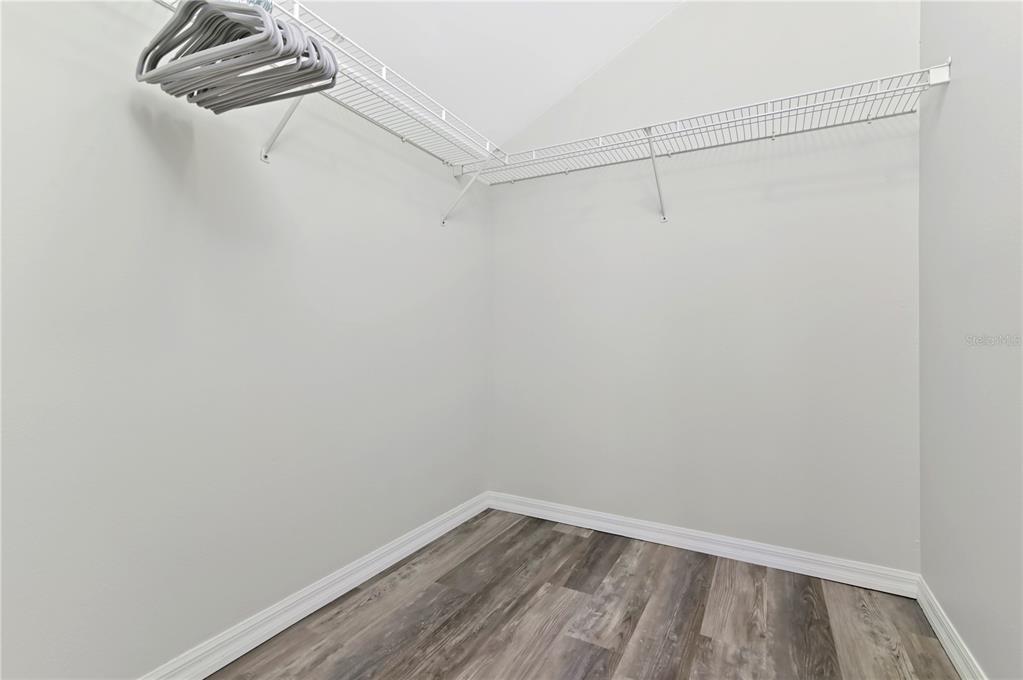 16640 Palm Spring Drive Clermont, FL 34714 - Photo 61 of 79 a view of a room with racks on the wall