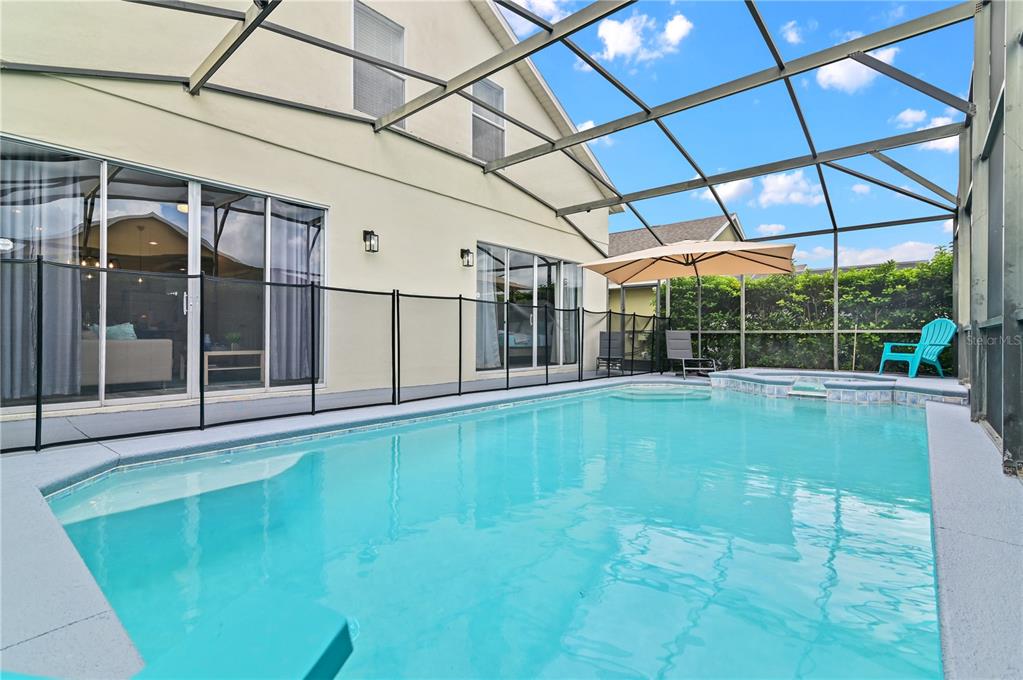 16640 Palm Spring Drive Clermont, FL 34714 - Photo 75 of 79 a view of a backyard with a swimming pool