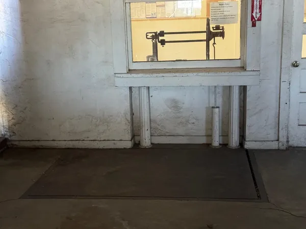 a view of a house with wooden stairs