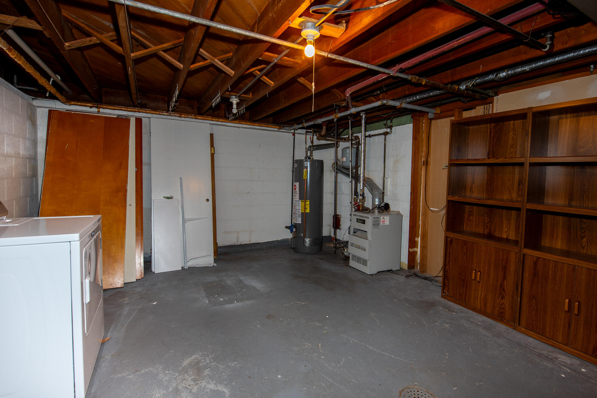620 Melvin Avenue Racine, WI 53402 - Photo 19 of 25 Basement area with stored closet doors and 3rd bedroom door.