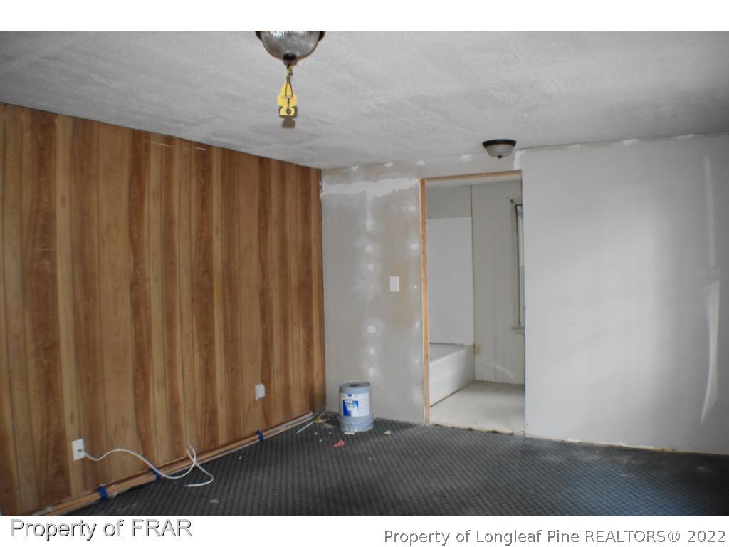 216 Sands Road Carthage, NC 28327 - Photo 19 of 28 a view of entryway with wooden floor