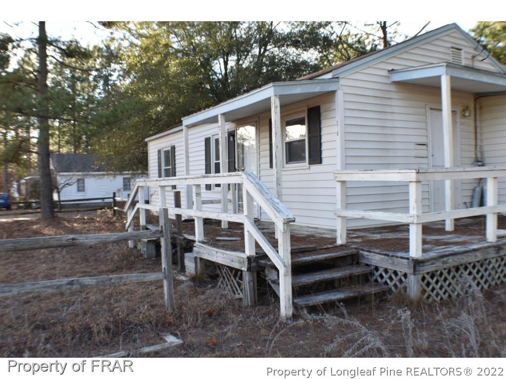 216 Sands Road Carthage, NC 28327 - Photo 2 of 28 a view of a house with a yard