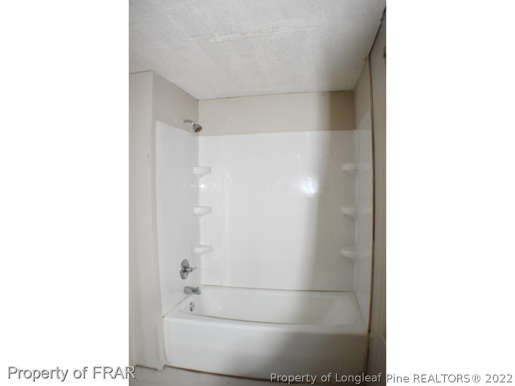 216 Sands Road Carthage, NC 28327 - Photo 21 of 28 a bathroom with a shower