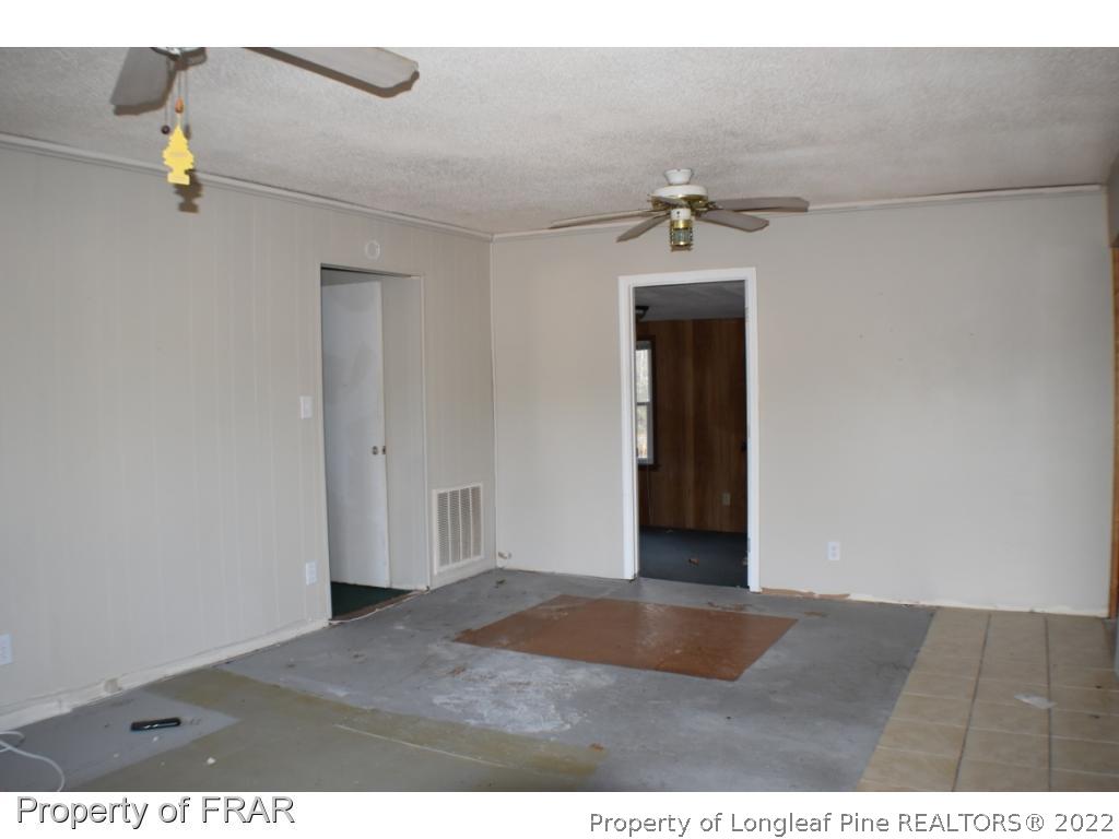 216 Sands Road Carthage, NC 28327 - Photo 3 of 28 a view of a room with an empty space