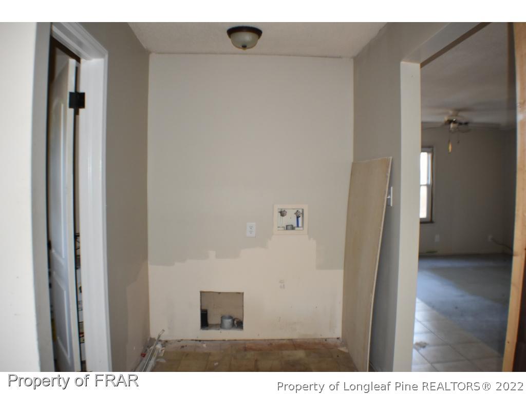 216 Sands Road Carthage, NC 28327 - Photo 8 of 28 a view of a hallway with wooden floor