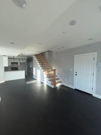 a view of a room with lots of trees in it