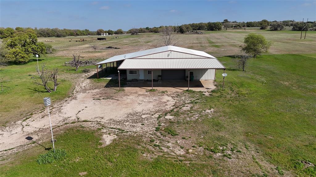 278 County Road 4460 Decatur, TX 76234 - Photo 1 of 19 an aerial view of a house with a yard and lake view