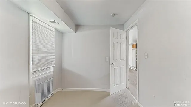 an empty room with a window