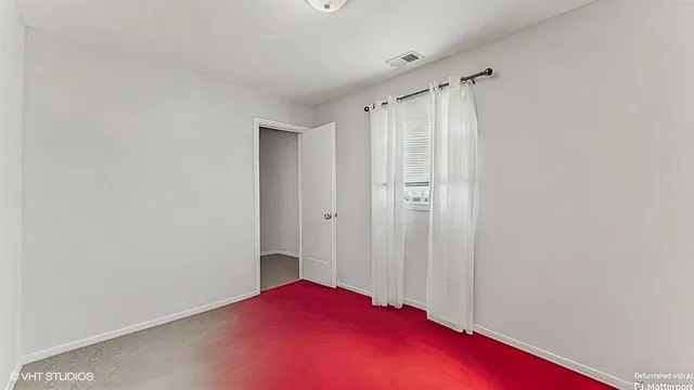 a bathroom with a shower curtain
