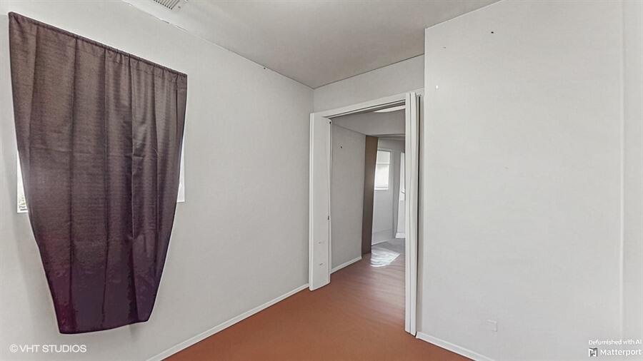 2140 Indianapolis Boulevard Whiting, IN 46394 - Photo 26 of 63 a view of a hallway with wooden floor