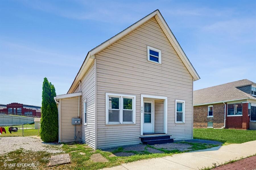 2140 Indianapolis Boulevard Whiting, IN 46394 - Photo 37 of 63 a view of a house with a yard