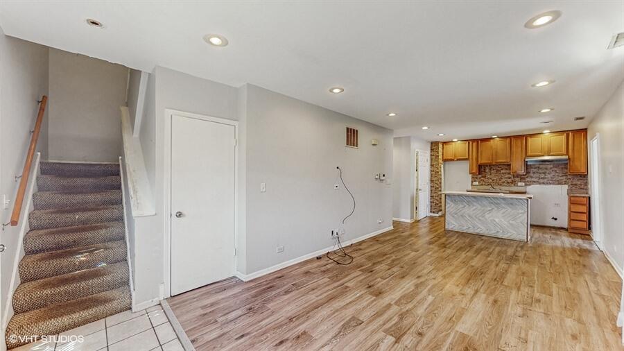 2140 Indianapolis Boulevard Whiting, IN 46394 - Photo 39 of 63 a view of a kitchen with a sink and cabinets
