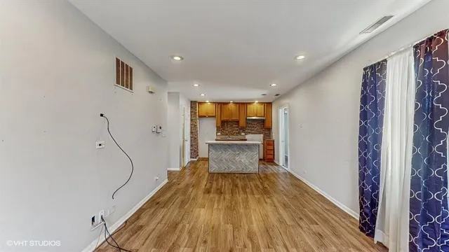 a bathroom with a sink and a shower