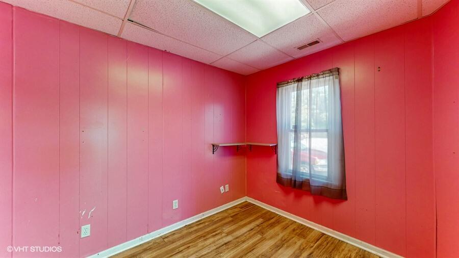 2140 Indianapolis Boulevard Whiting, IN 46394 - Photo 44 of 63 a view of a room with wooden floor and windows