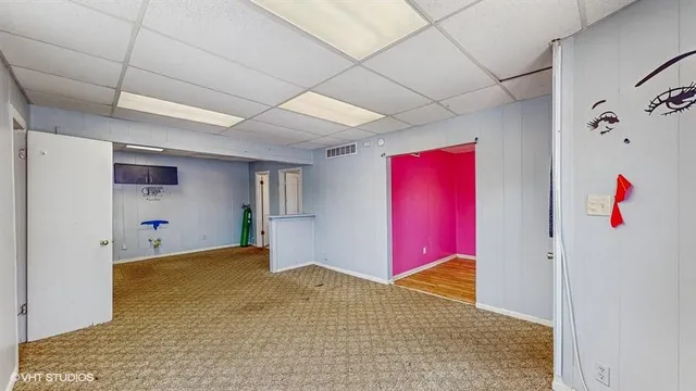 a bathroom with a bathtub and shower