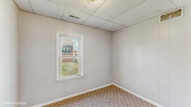 a picture of a bathroom with a shower