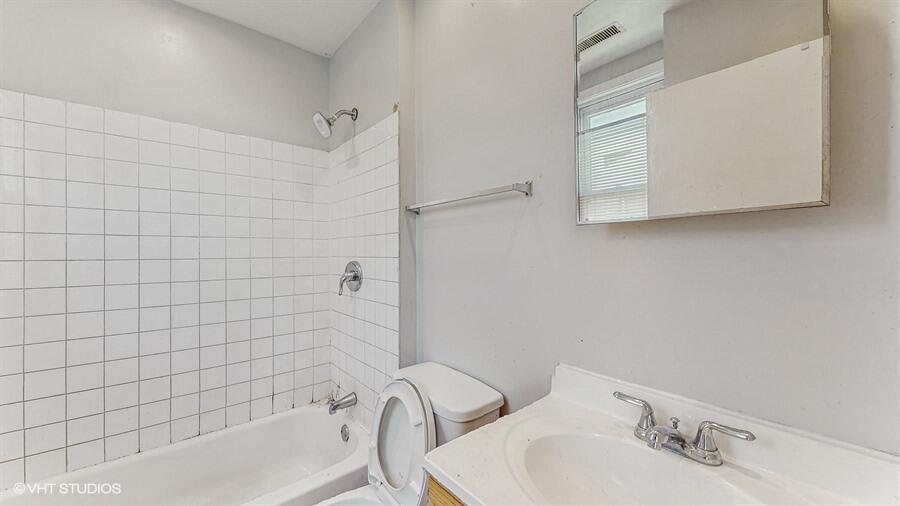 2140 Indianapolis Boulevard Whiting, IN 46394 - Photo 49 of 63 a bathroom with a sink and a bathtub