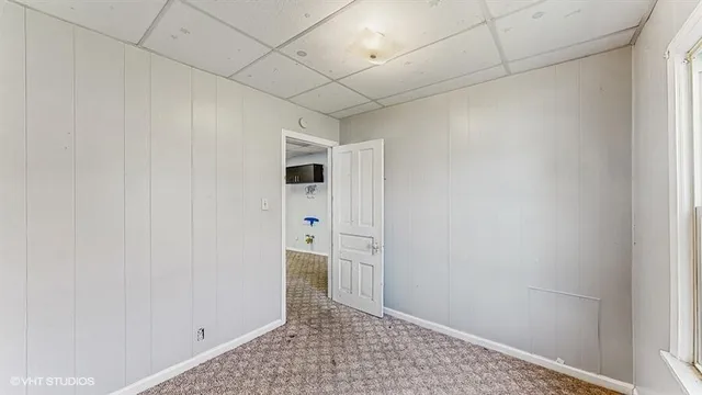 a view of a big yard with a house