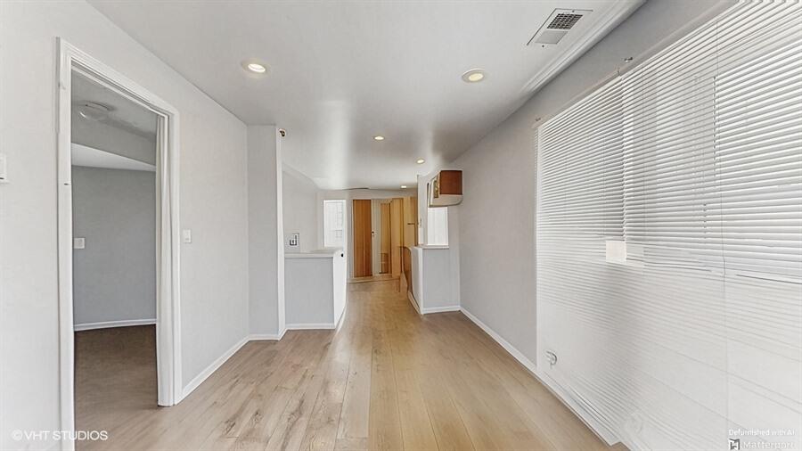 2140 Indianapolis Boulevard Whiting, IN 46394 - Photo 6 of 63 a view of hallway with wooden floor