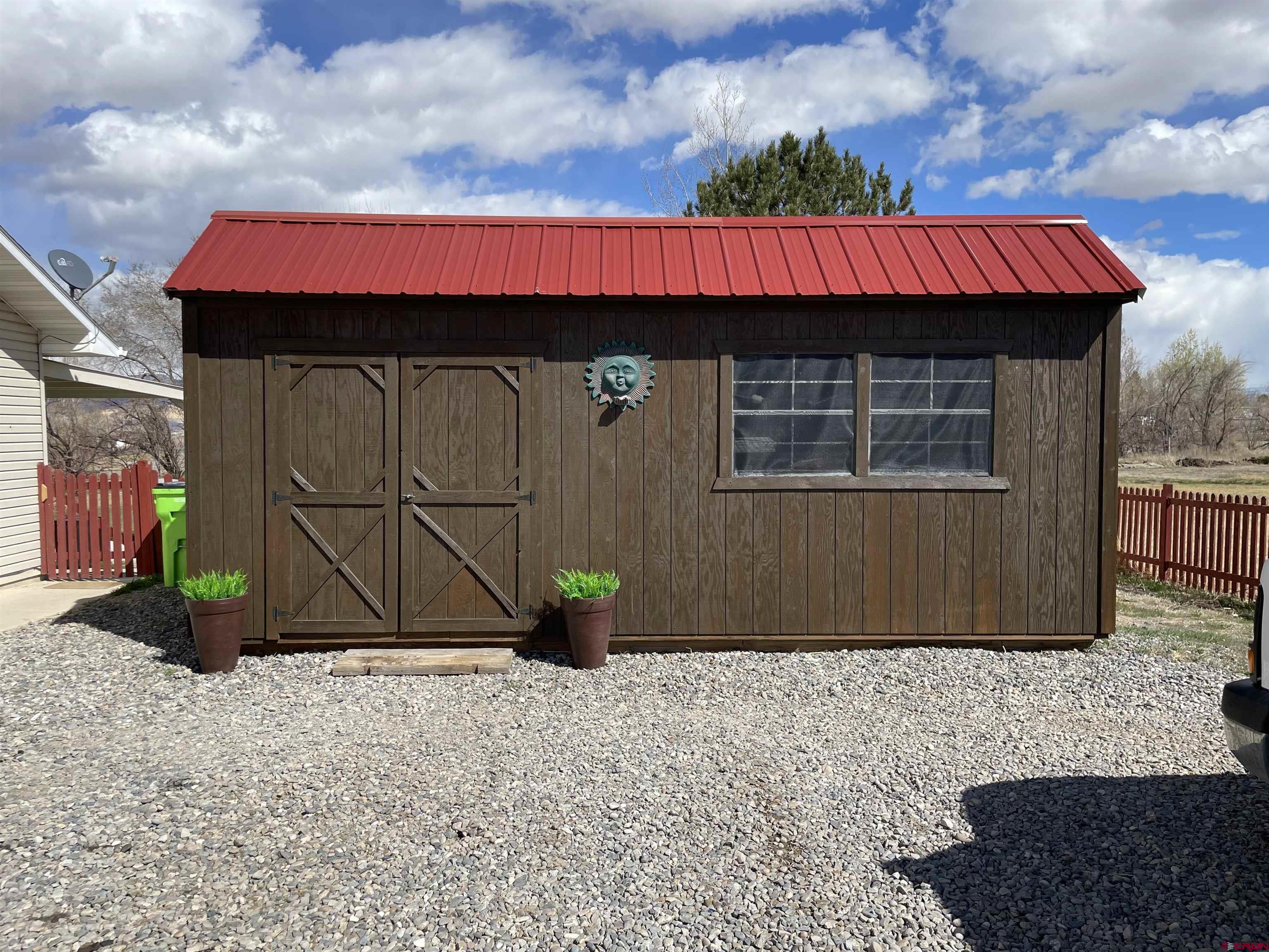 8902 6085 Road Montrose, CO 81401 - Photo 20 of 31 a view of a house with a garage